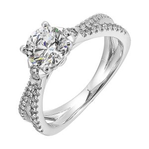 A split shank featuring two rows of diamond, sitting pretty right on top is the round solitare, with one round diamond on each side is sure a stunner.