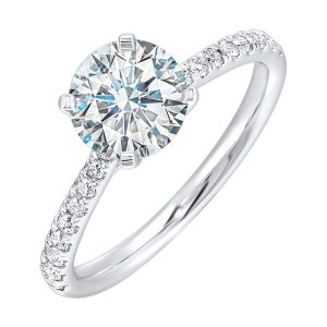 Petite set diamonds adds excitement to this classic solitaire ring perfectly showcases timeless love for her.
